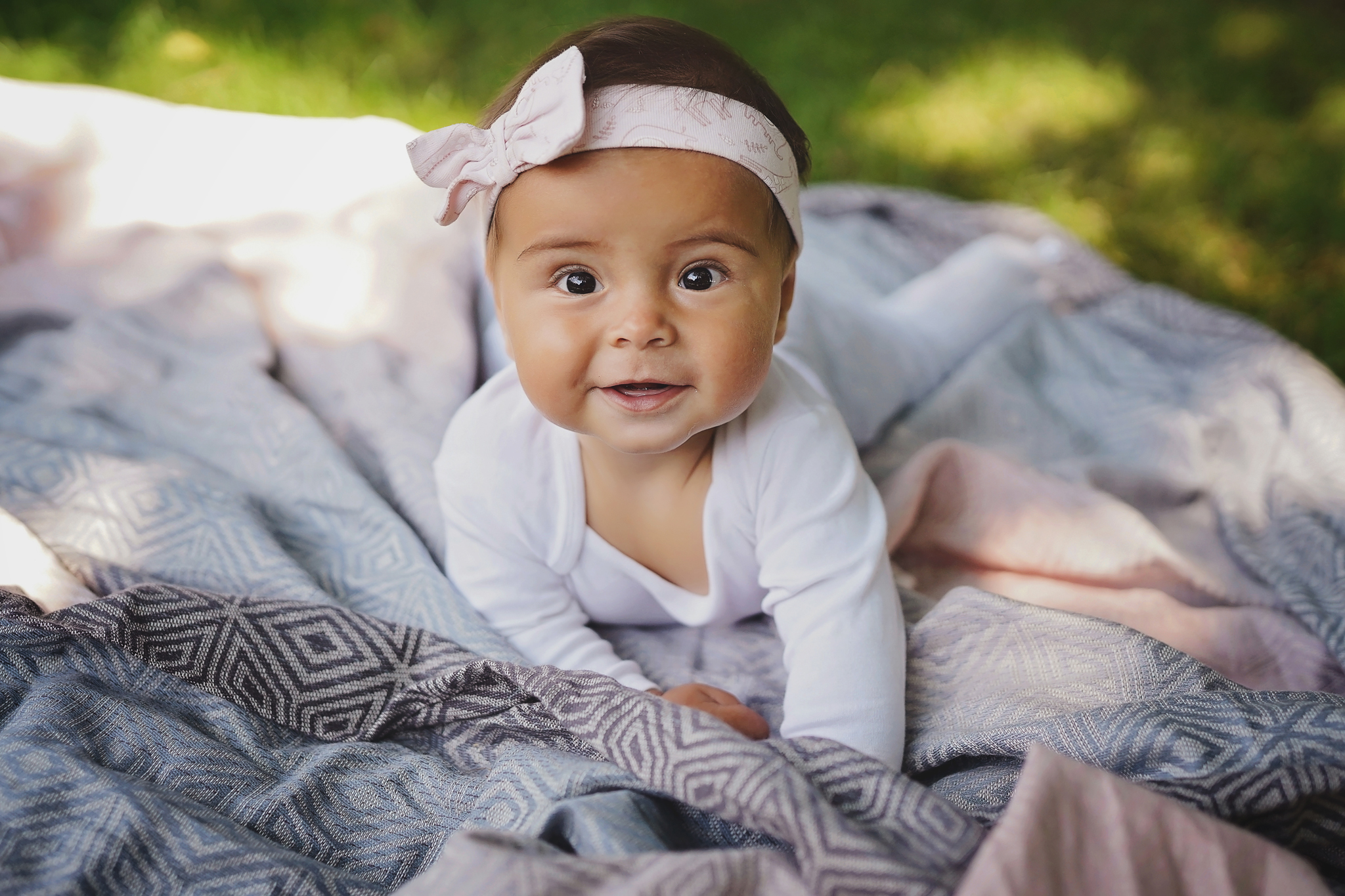 Une layette pour un nouveau-né - une écharpe de portage ou un porte-bébé ergonomique - ne doit pas manquer.