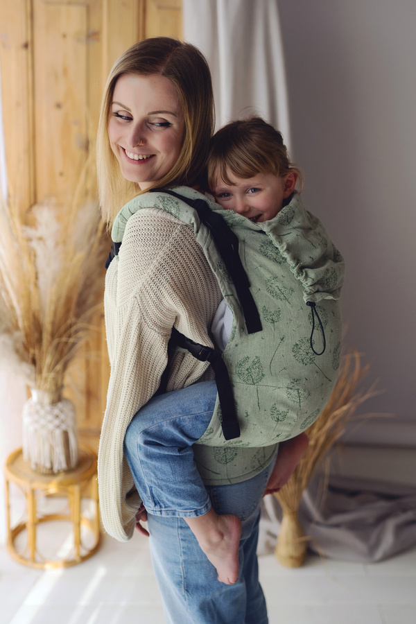 Grüne Kindertrage Preschooler Flow Lightness mit Leinen – Löwenzahn